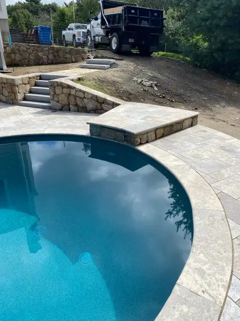 Pool with stone coping